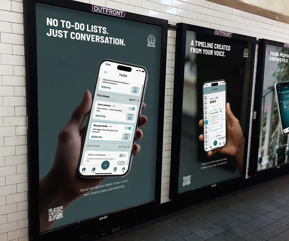Three Recall digital billboards outside a building